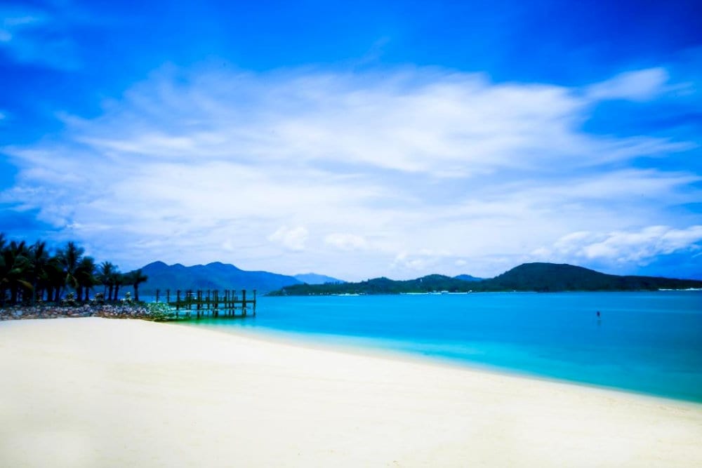 The beach is a beautiful and tranquil beach known for its clear waters and scenic beauty